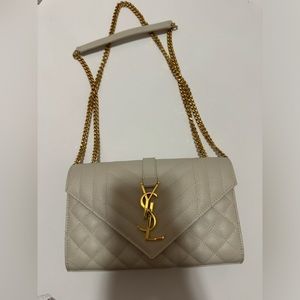 Saint Laurent
ENVELOPE SMALL IN QUILTED GRAIN DE POUDRE EMBOSSED LEATHER